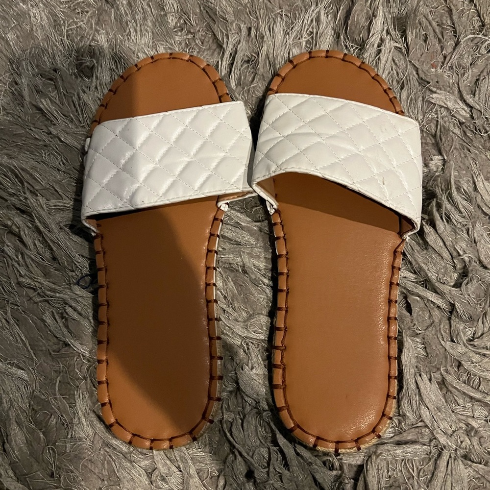 White quilted sandals